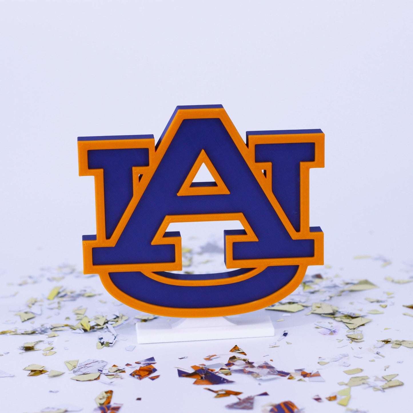 University of Auburn decoration surrounded by confetti.