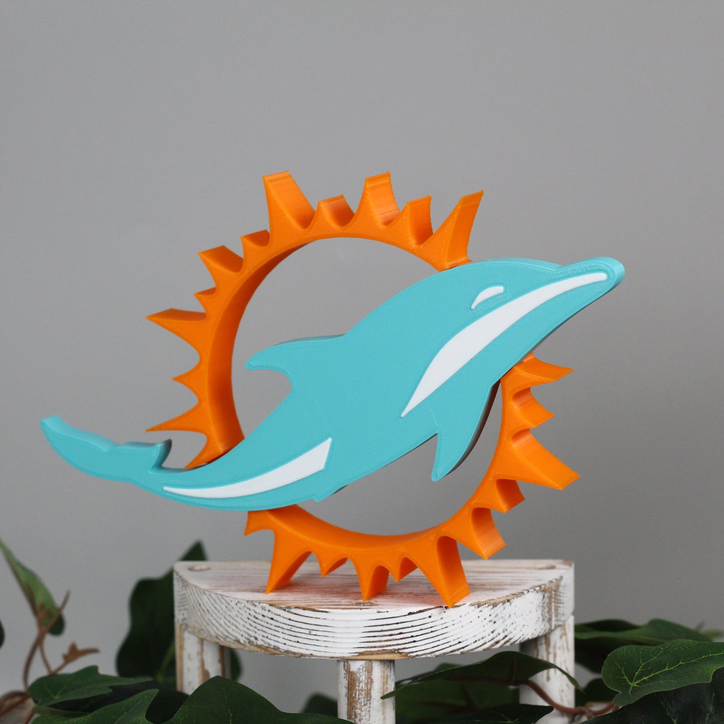 Miami Dolphins decoration on a stand.
