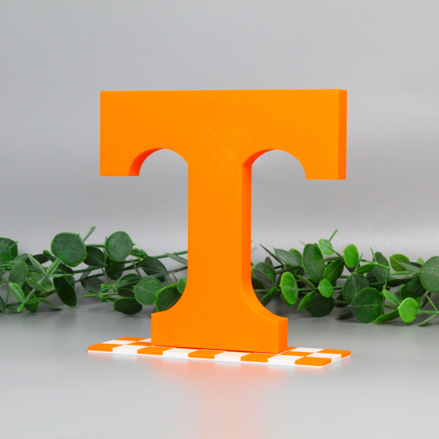 University of Tennessee decoration with ivy behind it, turned left.