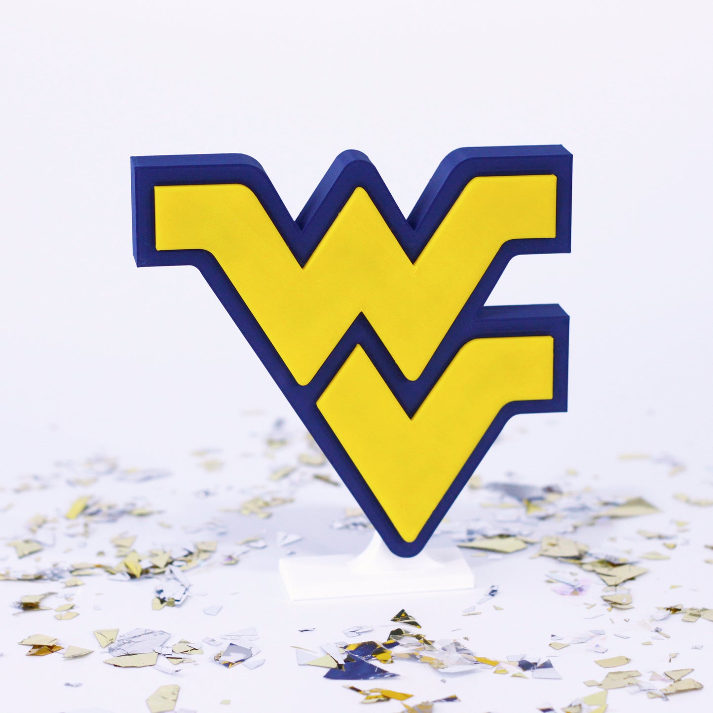 West Virginia University decoration surrounded by confetti.